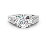 Platinum Three-Stone Round Cut Cut Diamond Ring with Trillion Side Stones on a Split Shank Band_13