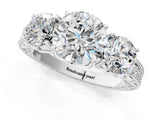 Platinum Three-Stone Round Cut Cut Milgrain Pavé Engagement Ring_8
