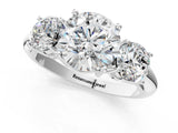 Platinum Three-Stone Round Cut Diamond Engagement Ring with Prong Setting on a White Gold Band_51