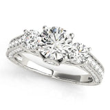 Platinum Three-Stone Round Cut Diamond Engagement Ring with Split Shank and Prong Setting