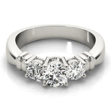 Platinum Three-Stone Round Cut Diamond Ring with Channel Band and Prong Setting 1