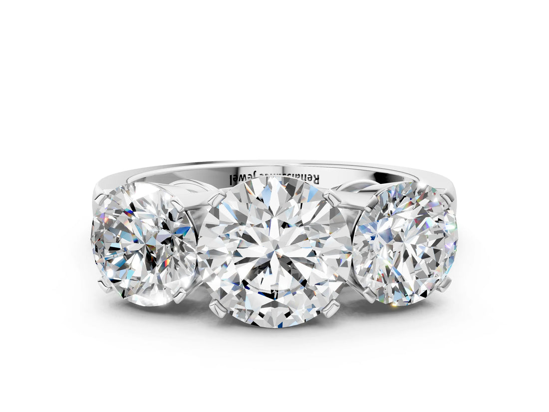 Platinum Three-Stone Round Cut Diamond Ring with Channel Set Band and Four-Prong Setting_18