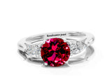 Platinum Three-Stone Round Cut Garnet Ring with Pear  Side Stones in Four-Prong Setting_66