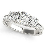 Platinum Three-Stone Round Cut Pavé Band with Prong Setting