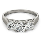 Platinum Three-Stone Round Cut Solitaire Ring with Classic Band and Prong Setting 1