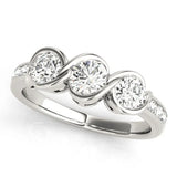 Platinum Three-Stone Round Diamond Twist Band with Channel Setting