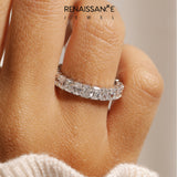 Platinum radiant eternity band with shared prong setting