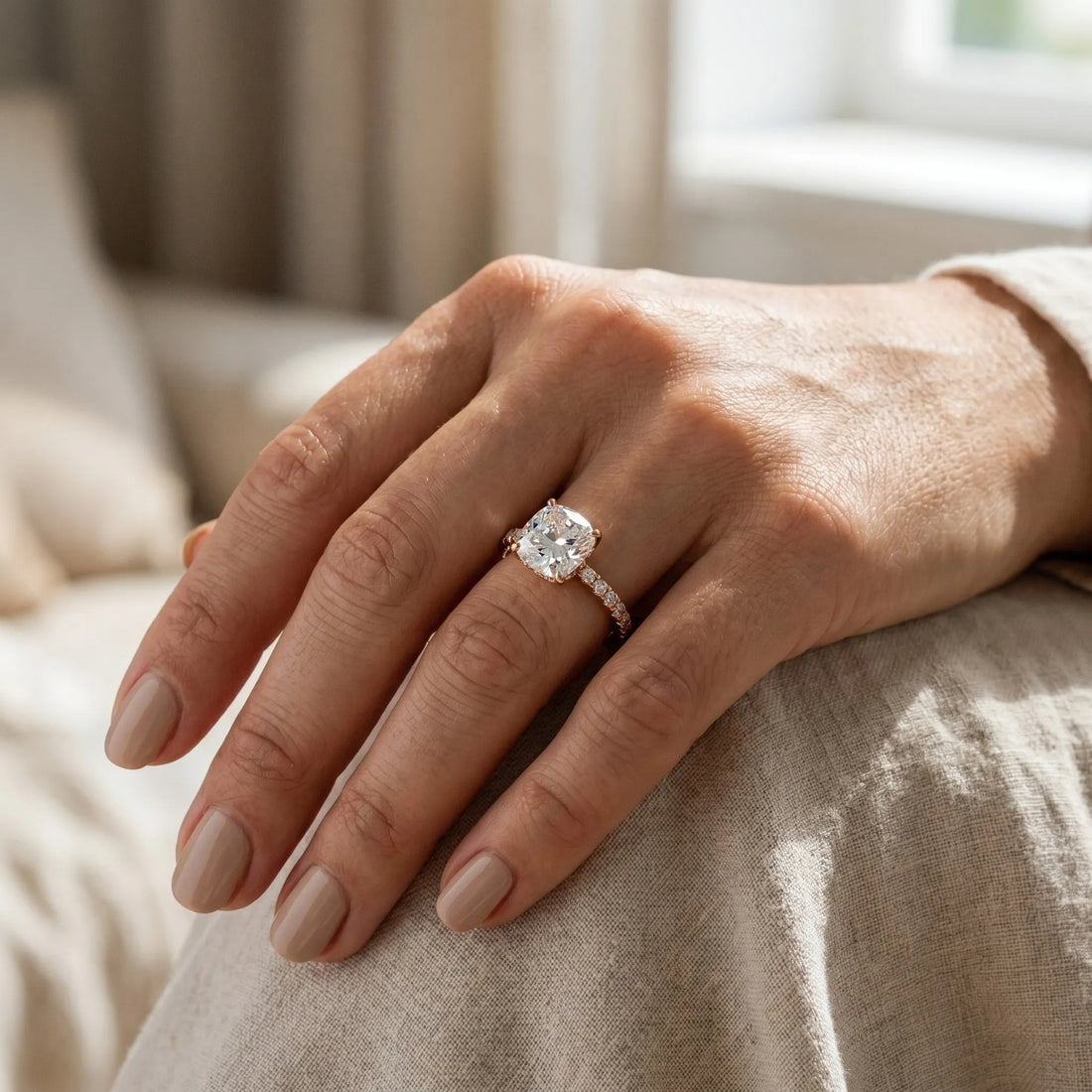 Rose gold 1 Carat Cushion Cut Diamond Solitaire Ring with Round  Pavé Band and Four-Prong Setting