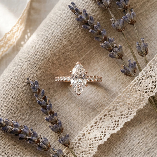 1 Carat Marquise Cut Rose gold Diamond Solitaire Ring with Round Pavé Band and Four-Prong Setting