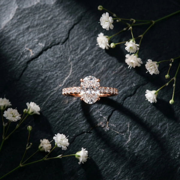 1 Carat Oval Cut Rose gold Diamond Solitaire Ring with Round Pavé Band and Four-Prong Setting