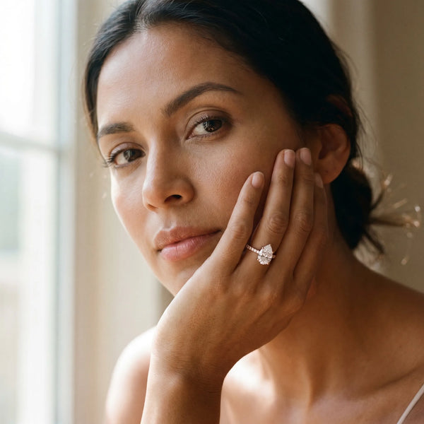 1 Carat Pear Cut Rose gold Diamond Solitaire Ring with Round Pavé Band and Four-Prong Setting