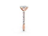Rose gold 2 Carat Pear Cut  Solitaire with Side Stones on a Pavé Band and Four-Prong Setting_26