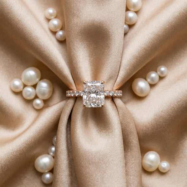 2 Carat Radiant Cut Rose gold Diamond Solitaire Ring with Round Pavé Band and Four-Prong Setting