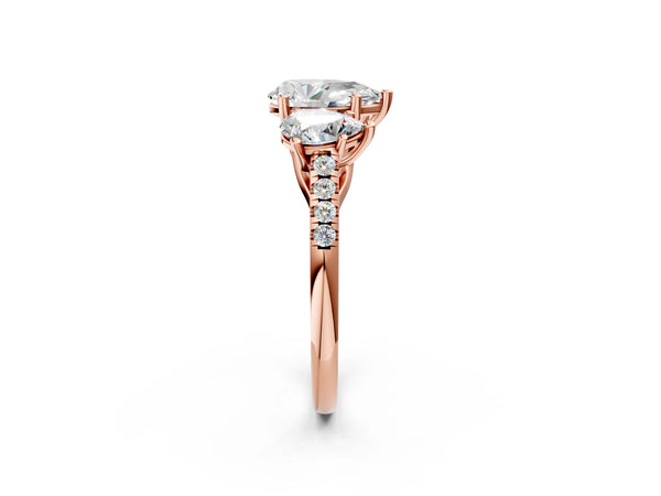 Rose gold 2 Carat Three-Stone Pear Cut Diamond Ring with Round  Pavé Band and Prong Setting