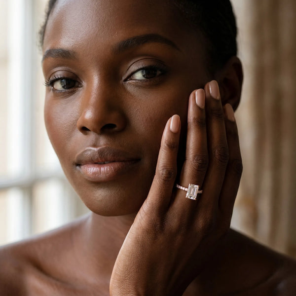3 Carat Emerald Cut Rose gold Diamond Solitaire Ring with Round Pavé Band and Four-Prong Setting
