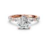 Rose gold 3 Carat Heart Cut  Solitaire with Side Stones on a Pavé Band and Four-Prong Setting