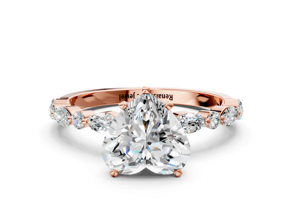 3 Carat Heart Cut Rose gold Diamond Ring with Marquise and Round Side Stones and Four-Prong Setting