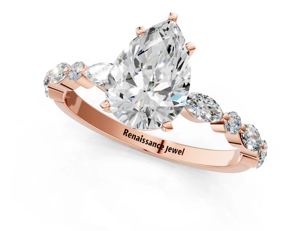3 Carat Pear Cut Rose gold Diamond Ring with Marquise and Round Side Stones and Four-Prong Setting