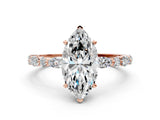Rose gold 4 Carat Marquise Cut  Solitaire with Side Stones on a Pavé Band and Four-Prong Setting
