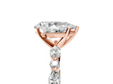Rose gold 4 Carat Pear Cut  Solitaire with Side Stones on a Pavé Band and Four-Prong Setting_17