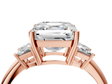 Rose gold Asscher Diamond Three-Stone Ring with Trapezoid Side Stones and Prong Setting_44