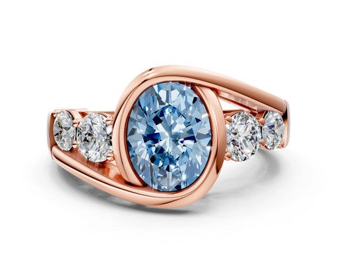 Rose gold Bezel Set Fancy Blue Oval Cut Diamond Split Shank Ring