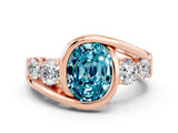 Rose gold Bezel Set Oval Cut Diamond Split Shank Ring