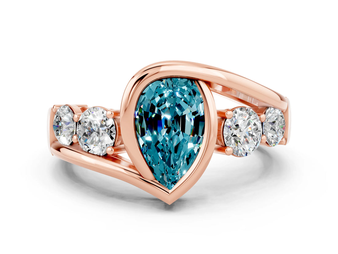 Rose gold Bezel Set Pear Cut Diamond Split Shank Ring