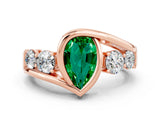 Rose gold Bezel Set Pear Cut Diamond Split Shank Ring