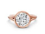 Rose gold Bezel Set Round Cut Solitaire Ring with Tapered Band