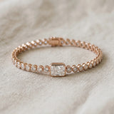 Rose gold Bezel-Set Round Diamond Tennis Bracelet with Radiant Center Diamond