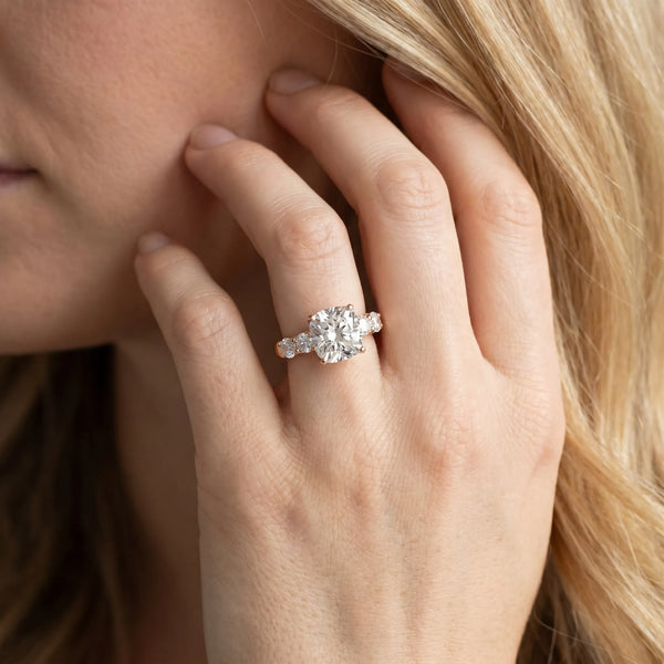 Rose gold Cushion Brilliant Diamond Five-Stone Engagement Ring with Prong Setting on a Classic Band