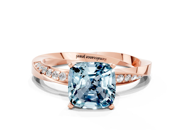 Rose gold Cushion Cut Aquamarine Engagement Ring with Side Stone Accents and Four-Prong Setting