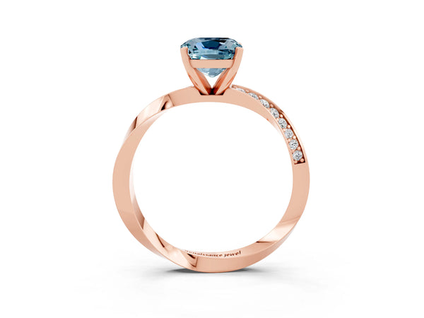 Rose gold Cushion Cut Aquamarine Engagement Ring with Side Stone Accents and Four-Prong Setting