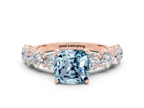 Rose gold Cushion Cut Aquamarine Prong Setting with Side Stones on a Pave Band