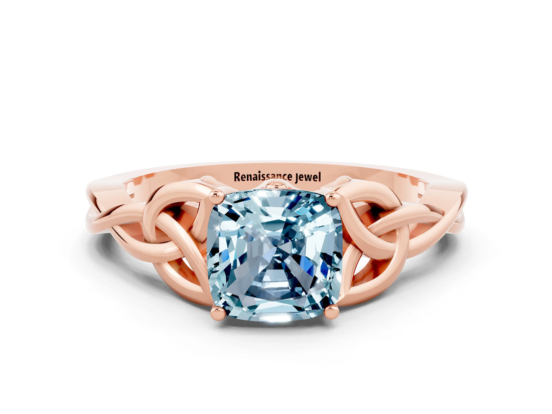 Rose gold Cushion Cut Aquamarine Solitaire Engagement Ring with Celtic Knot Band and Four-Prong Setting