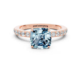 Rose gold Cushion Cut Aquamarine Solitaire Engagement Ring with Pavé Band and Four-Prong Setting