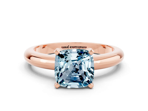 Rose gold Cushion Cut Aquamarine Solitaire Engagement Ring with Round Band and Four-Prong Setting