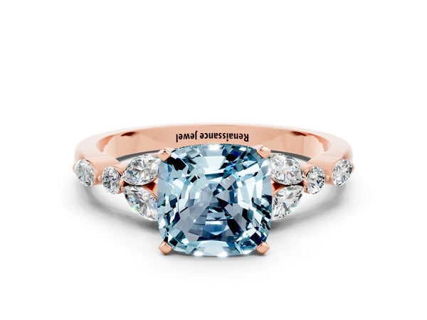 Rose gold Cushion Cut Aquamarine Solitaire Ring with Side Stones and Four-Prong Setting