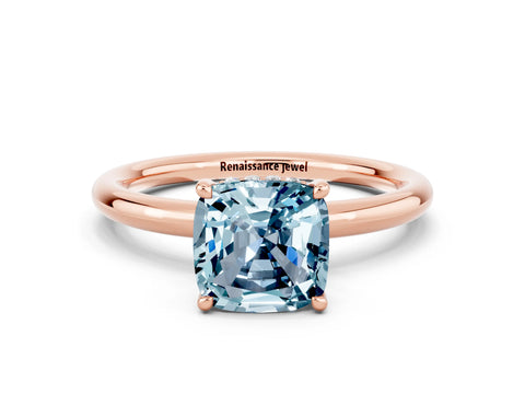Rose gold Cushion Cut Aquamarine Solitaire Ring with Thin Band and Four-Prong Setting