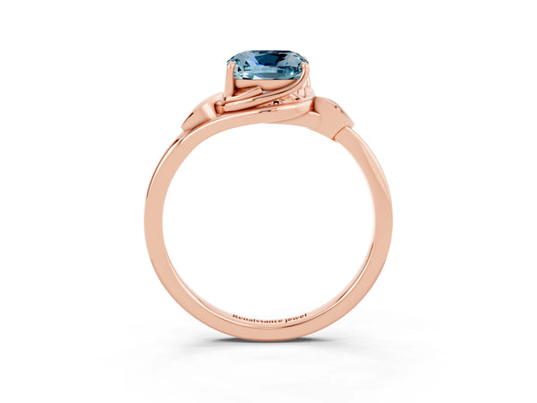 Rose gold Cushion Cut Aquamarine Solitaire Ring with Twist Band and Four-Prong Setting