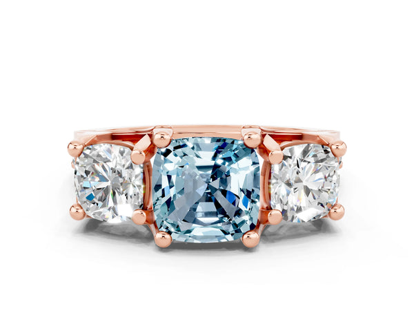 Rose gold Cushion Cut Aquamarine Three-Stone Ring with Channel Set Band and Four-Prong Setting