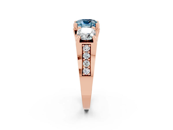Rose gold Cushion Cut Aquamarine Three-Stone Ring with Channel Set Band and Four-Prong Setting