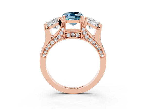Rose gold Cushion Cut Aquamarine Three-Stone Ring with Channel Set Band and Four-Prong Setting