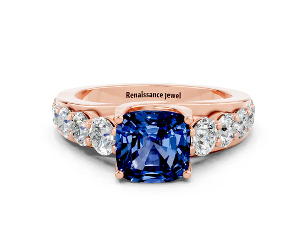 Rose gold Cushion Cut Blue Sapphire Engagement Ring with Pavé Band and Four-Prong Setting