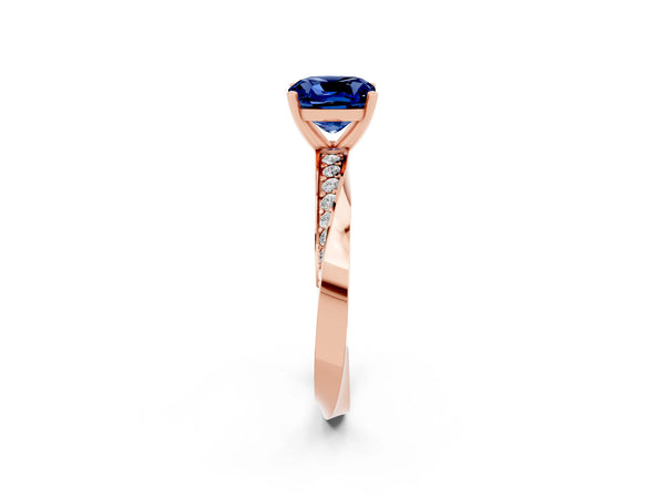 Rose gold Cushion Cut Blue Sapphire Engagement Ring with Side Stone Accents and Four-Prong Setting