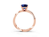 Rose gold Cushion Cut Blue Sapphire Engagement Ring with Side Stone Accents and Four-Prong Setting_87