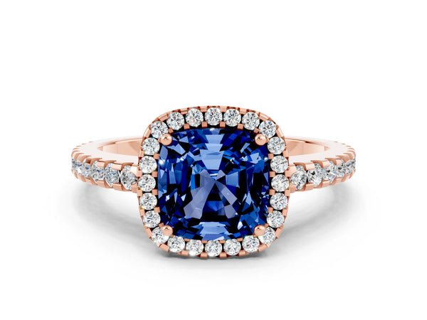 Rose gold Cushion Cut Blue Sapphire Halo Engagement Ring with Pavé Band and Prong Setting