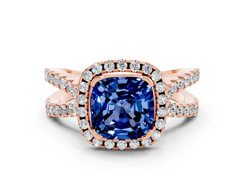 Rose gold Cushion Cut Blue Sapphire Halo Ring with Split Shank Pavé Band and Prong Setting