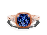 Rose gold Cushion Cut Blue Sapphire Halo Ring with Tapered Band and Four-Prong Setting